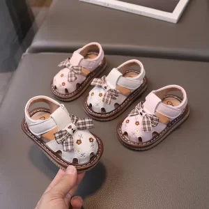 Sandal rọ tập đi họa tiết nơ hoa L3 nhí